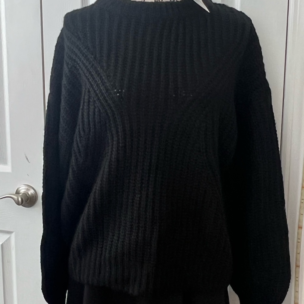Woman’s crew neck sweater